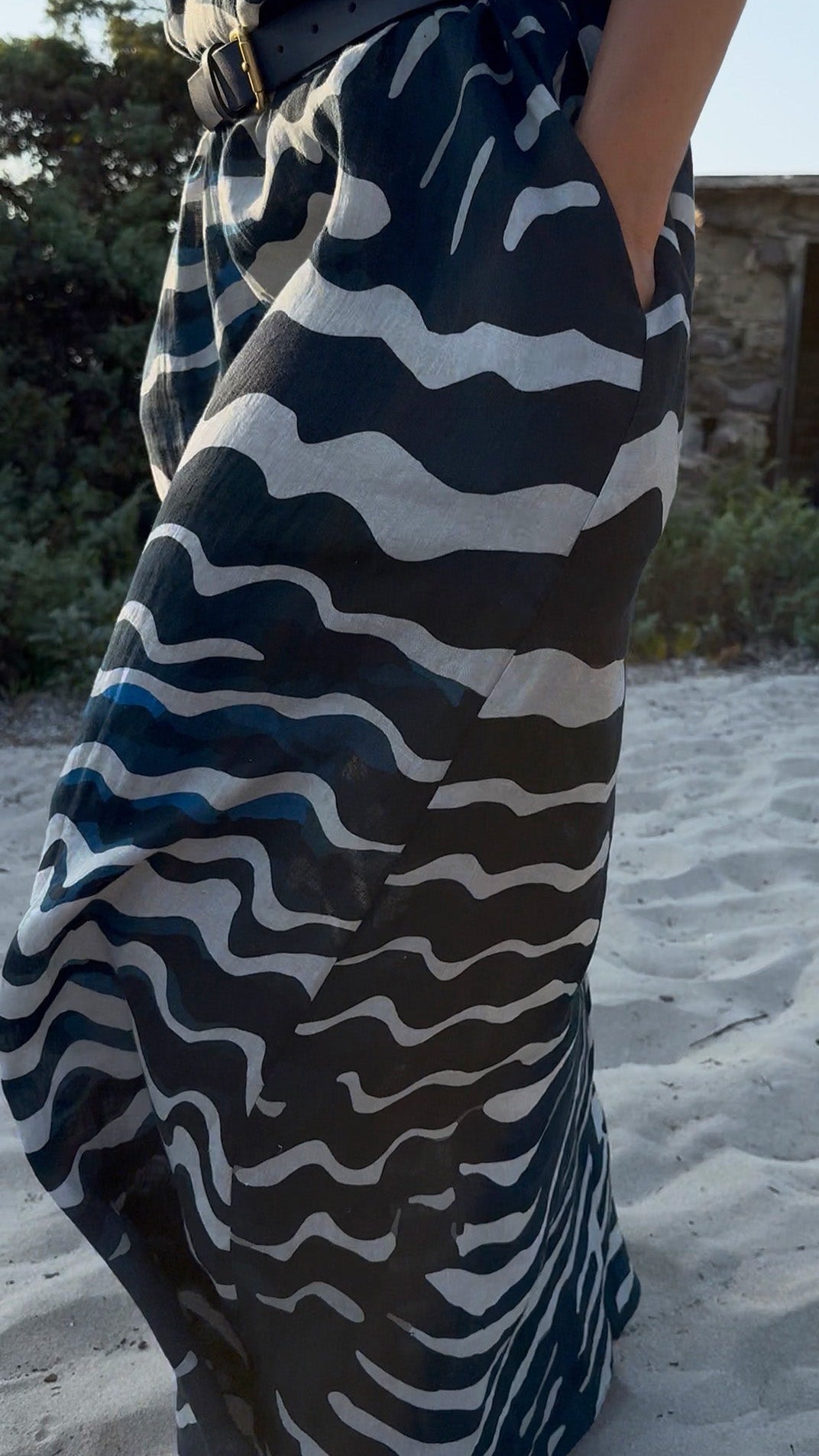 Blue Fans printed linen maxi dress showing relaxed silhouette and side pocket

