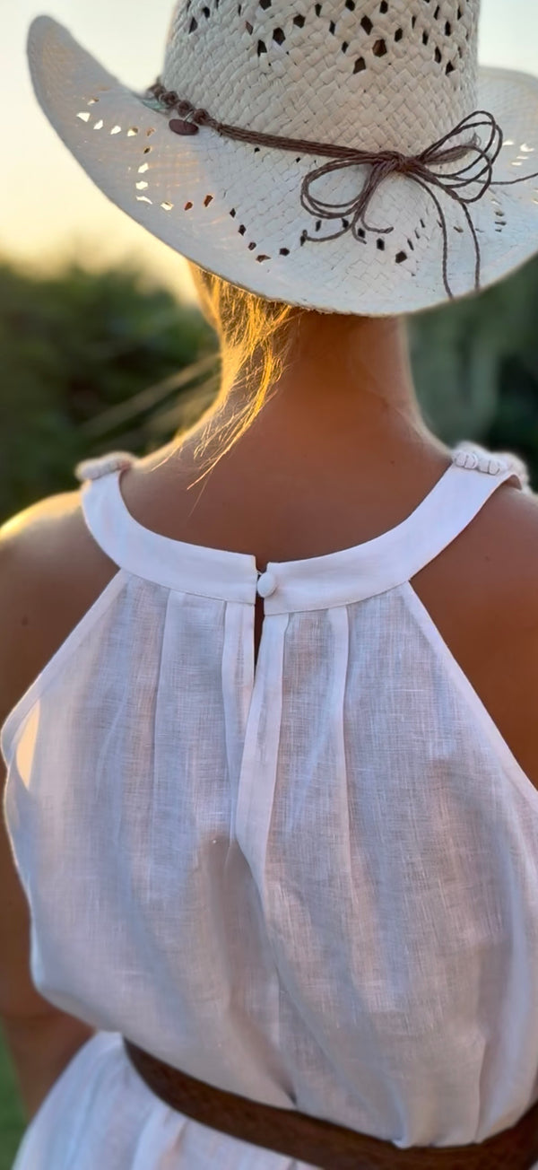 Handcrafted sculptural neckline detail on Maya white linen dress